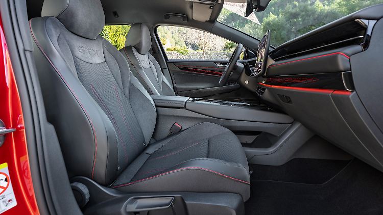 The seats are covered with a new microfiber material and have red contrast stitching and red GTX lettering.