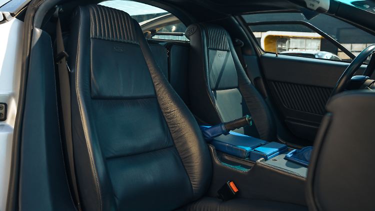 Is this supposed to be a sports car interior? Armchair-like seating is more reminiscent of a comfortable touring sedan.