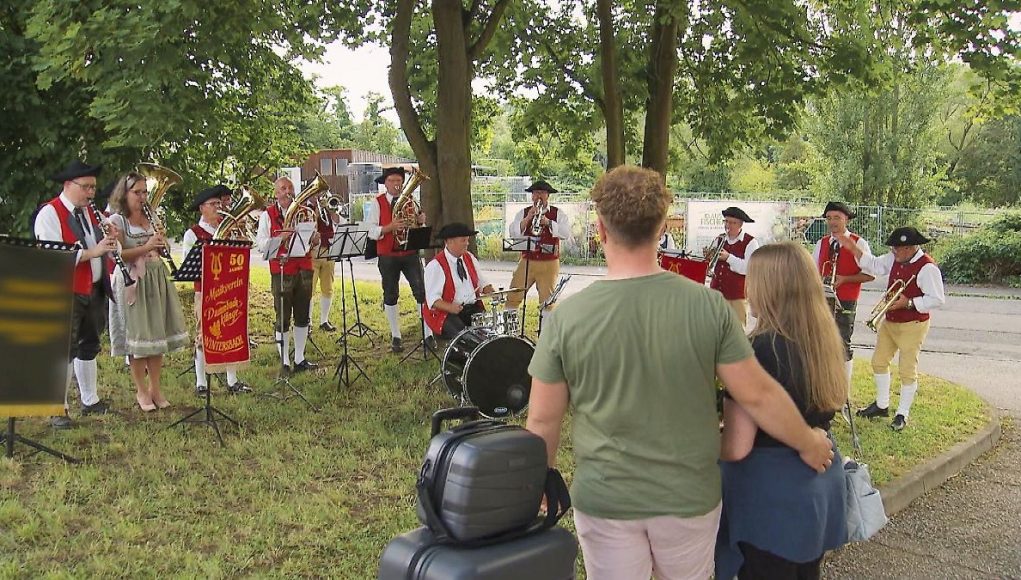 With a brass band into happiness in love
